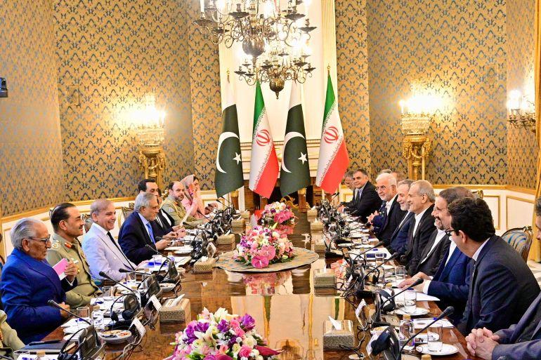 Pakistan Iran military talks army chief Iran visit handshake