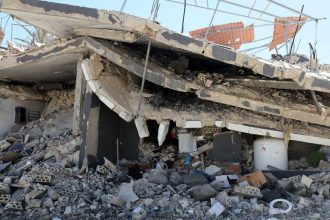 Pakistan school roof collapse illustrated by damaged concrete and structural debris.