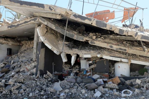 Pakistan school roof collapse illustrated by damaged concrete and structural debris.