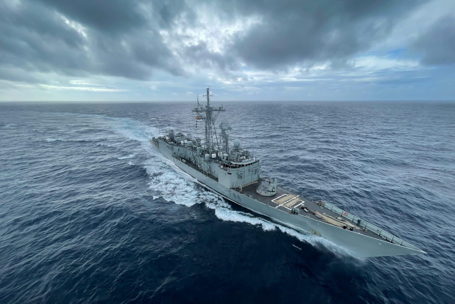 US Pacific strike maritime security illustration featuring a naval vessel operating at sea.