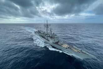 US Pacific strike maritime security illustration featuring a naval vessel operating at sea.