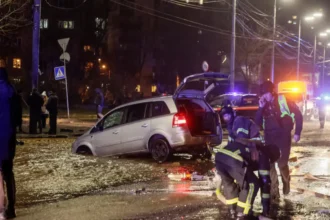 Russian missile and drone strike kills three in Kyiv