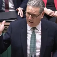 Starmer Cuts UK Aid to Fund Defense Boost