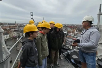 Students explore the restoration of St. Rumbold's Cathedral with teacher Steven Soetewey