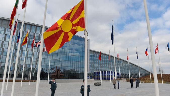 NATO member nation flags representing NATO military spending and alliance unity in 2026