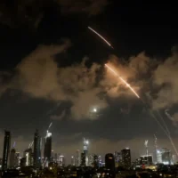 Thousands flee Tehran as Trump urges evacuation