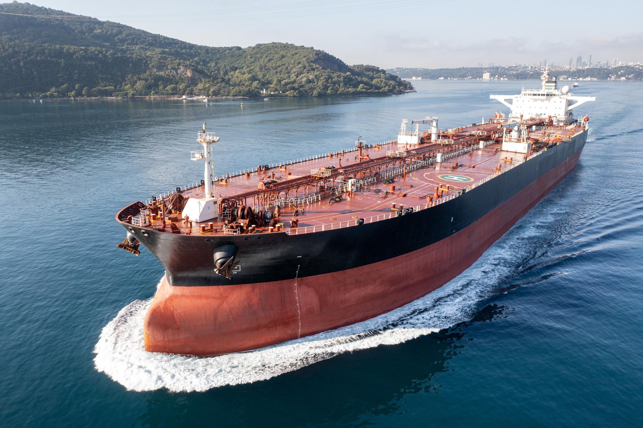 oil tanker transporting crude through Persian Gulf during oil prices surge Iran conflict tensions