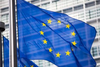 European Union flag illustrating Russia hybrid sanctions and EU security measures extended until 2027.