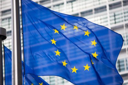 European Union flag illustrating Russia hybrid sanctions and EU security measures extended until 2027.