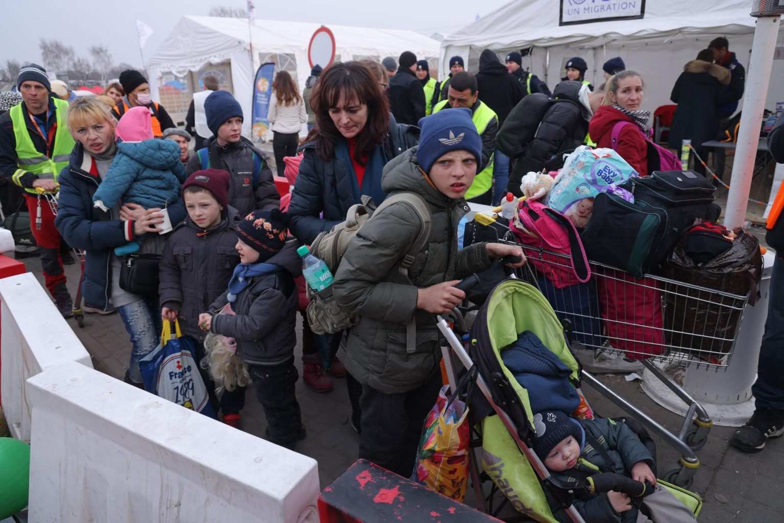 Ukrainian Refugees Europe arriving at EU border crossing during 2026 displacement crisis