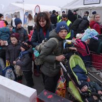 Ukrainian Refugees Europe arriving at EU border crossing during 2026 displacement crisis