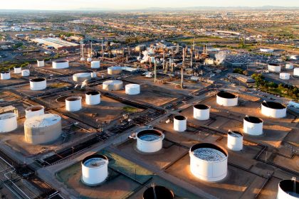 Crude oil storage tanks reflecting higher supply after the OPEC+ production decision