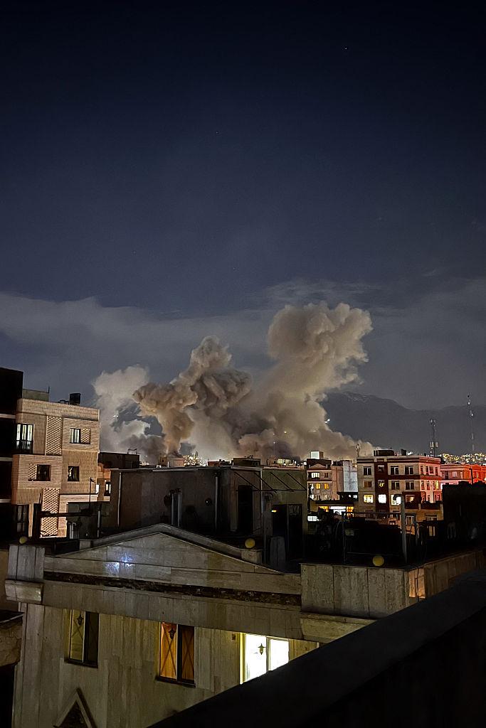 Smoke rising over the city after explosions in Tehran during regional tensions