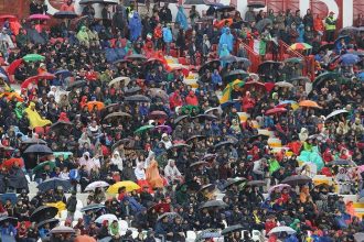 Germany Curacao fans gather with umbrellas before an international football match in Cincinnati 2026