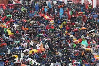 Germany Curacao fans gather with umbrellas before an international football match in Cincinnati 2026