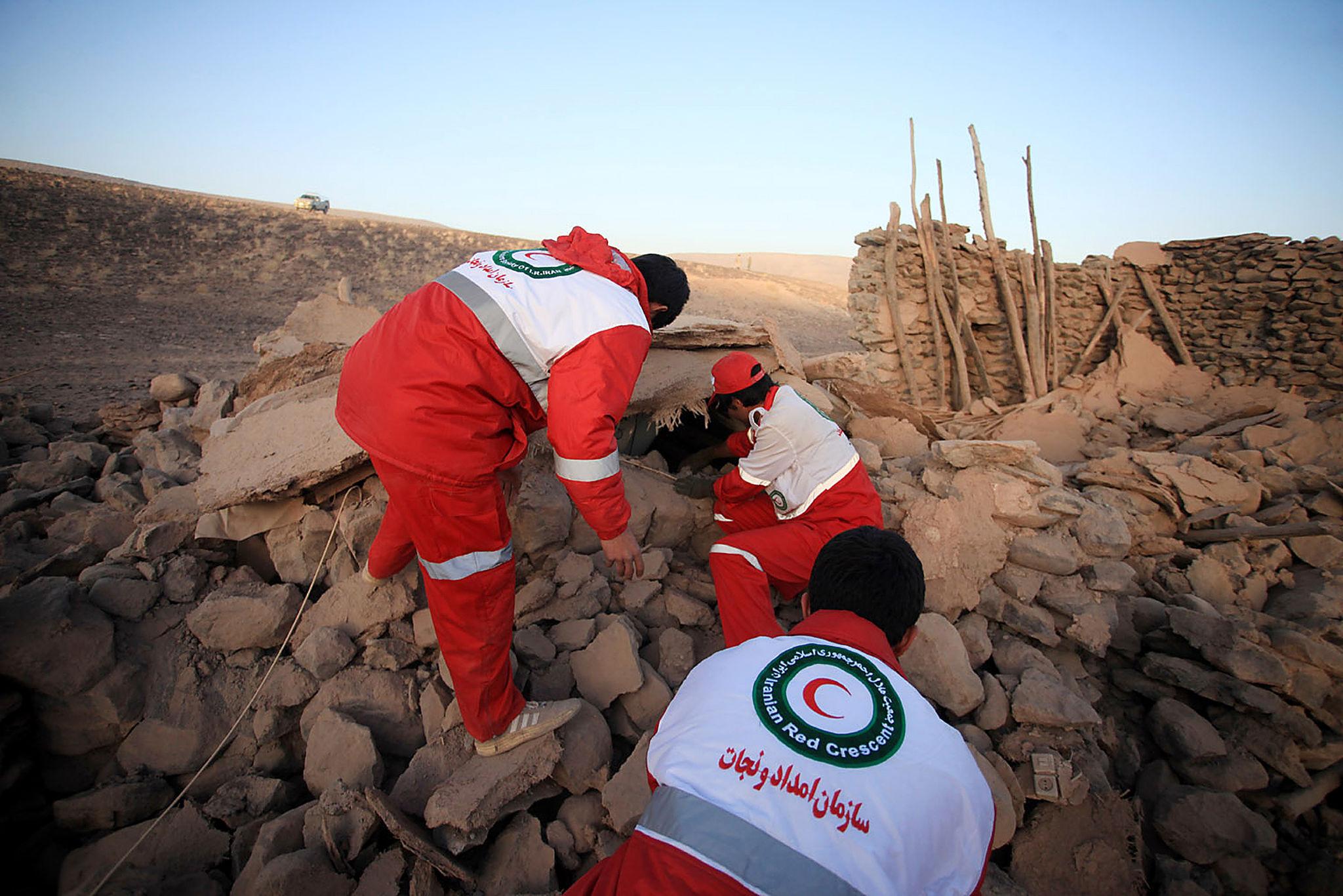 Displaced families living in temporary shelters amid Iran humanitarian crisis