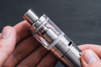 Adult using an e-cigarette instead of combustible cigarettes