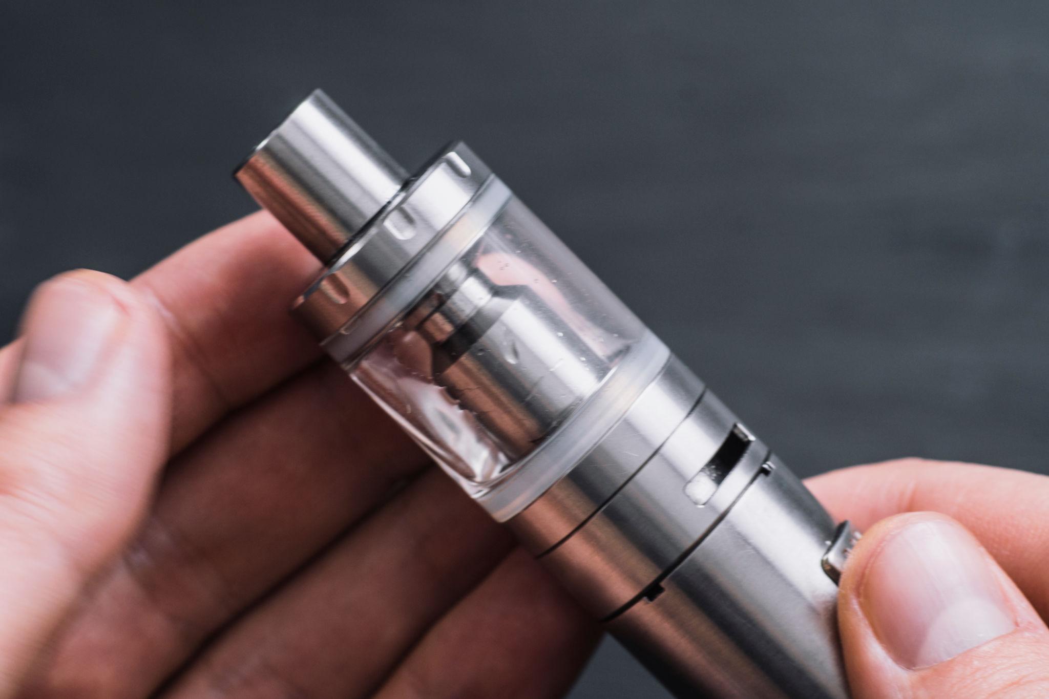 Adult using an e-cigarette instead of combustible cigarettes