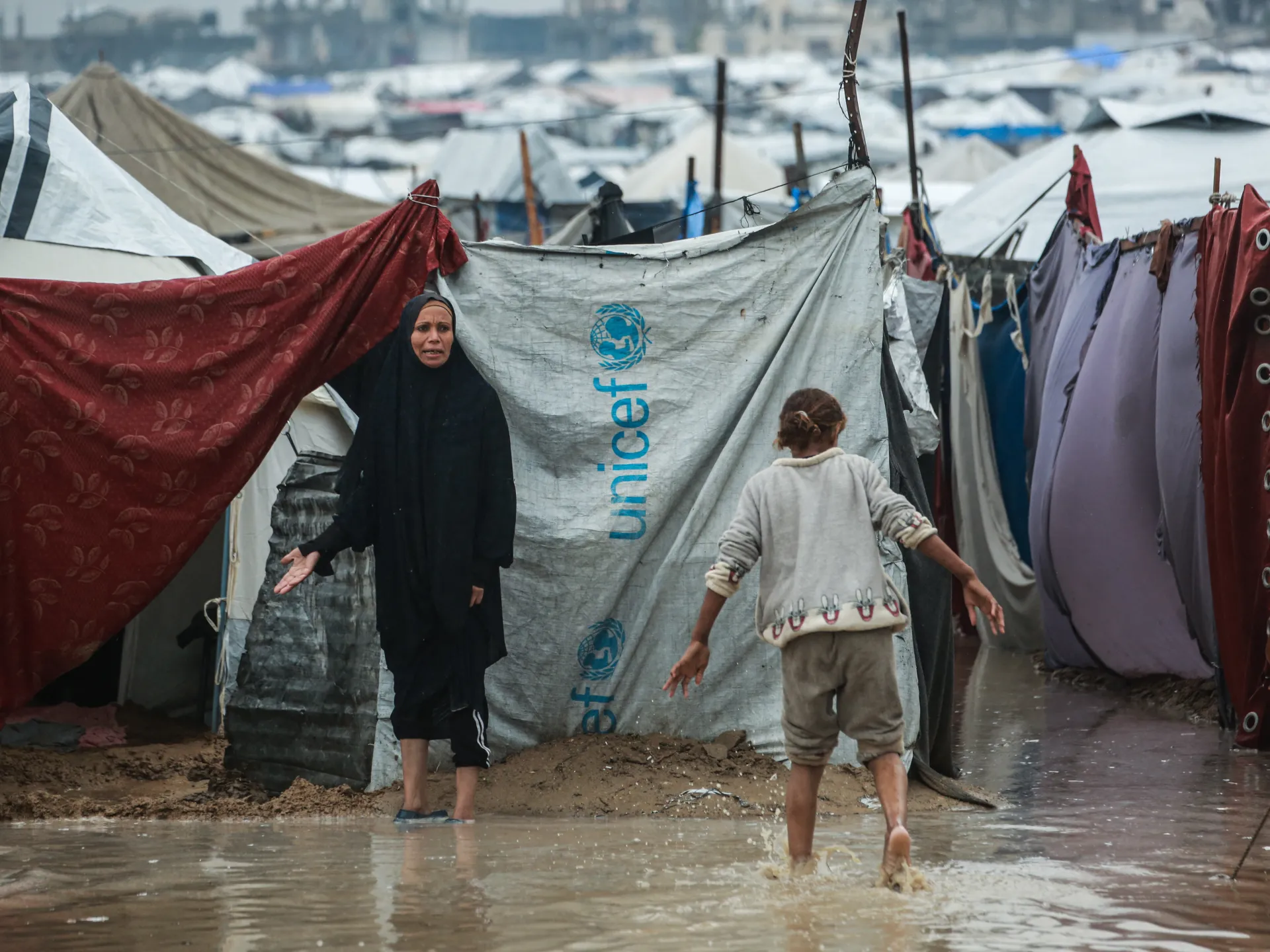 Gaza civilians winter storms cause flooding in camps
