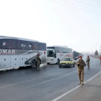 SDF fighters Syria absent as buses depart Aleppo district in 2026