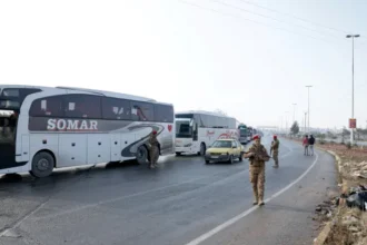 SDF fighters Syria absent as buses depart Aleppo district in 2026