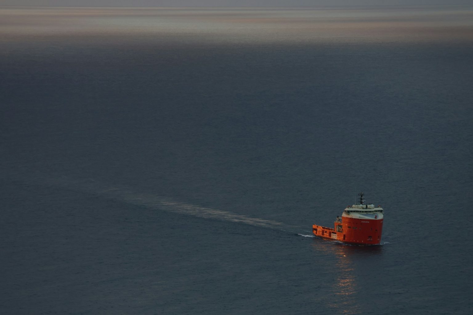 Gulf oil flows recover as tanker sails through international waters