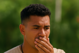 Dylan Towolawi reacts emotionally during Love Island finale after choosing money over love, intense facial expression captured outdoors.