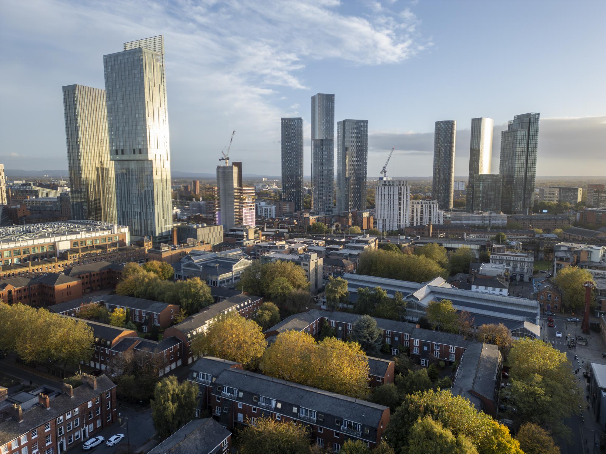 Manchester skyline connected to UK rejoin EU political and economic discussions in Britain