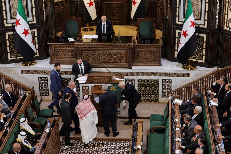 Syria new parliament holds its first session in Damascus