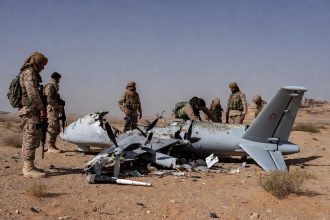 investigators examining wreckage after Iraq military aircraft crash