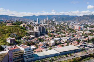 Tegucigalpa city skyline during Hernández return to Honduras