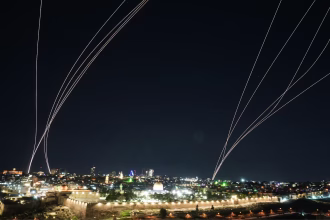 Qatar air defense system interceptor missile launch over Doha during missile defense operation