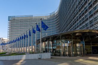 Booking.com investigation by the European Commission into fake hotel listings and online travel scams in Brussels.