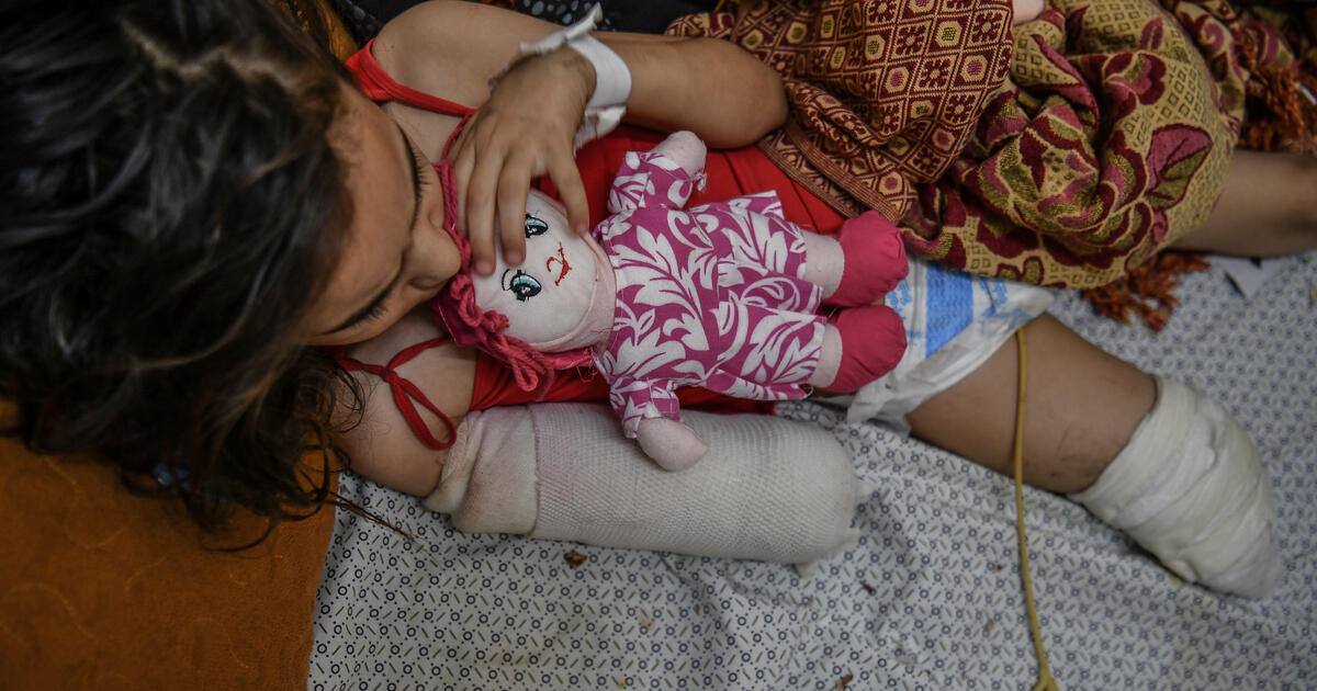 children killed Iran war damage to schools and community buildings