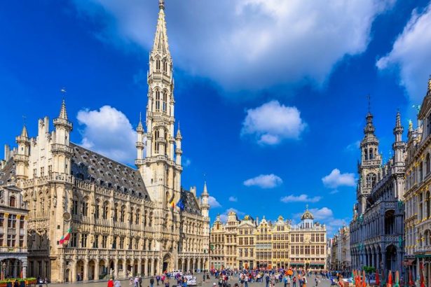 Heritage funding cuts protest involving historic monuments in Brussels, Belgium.