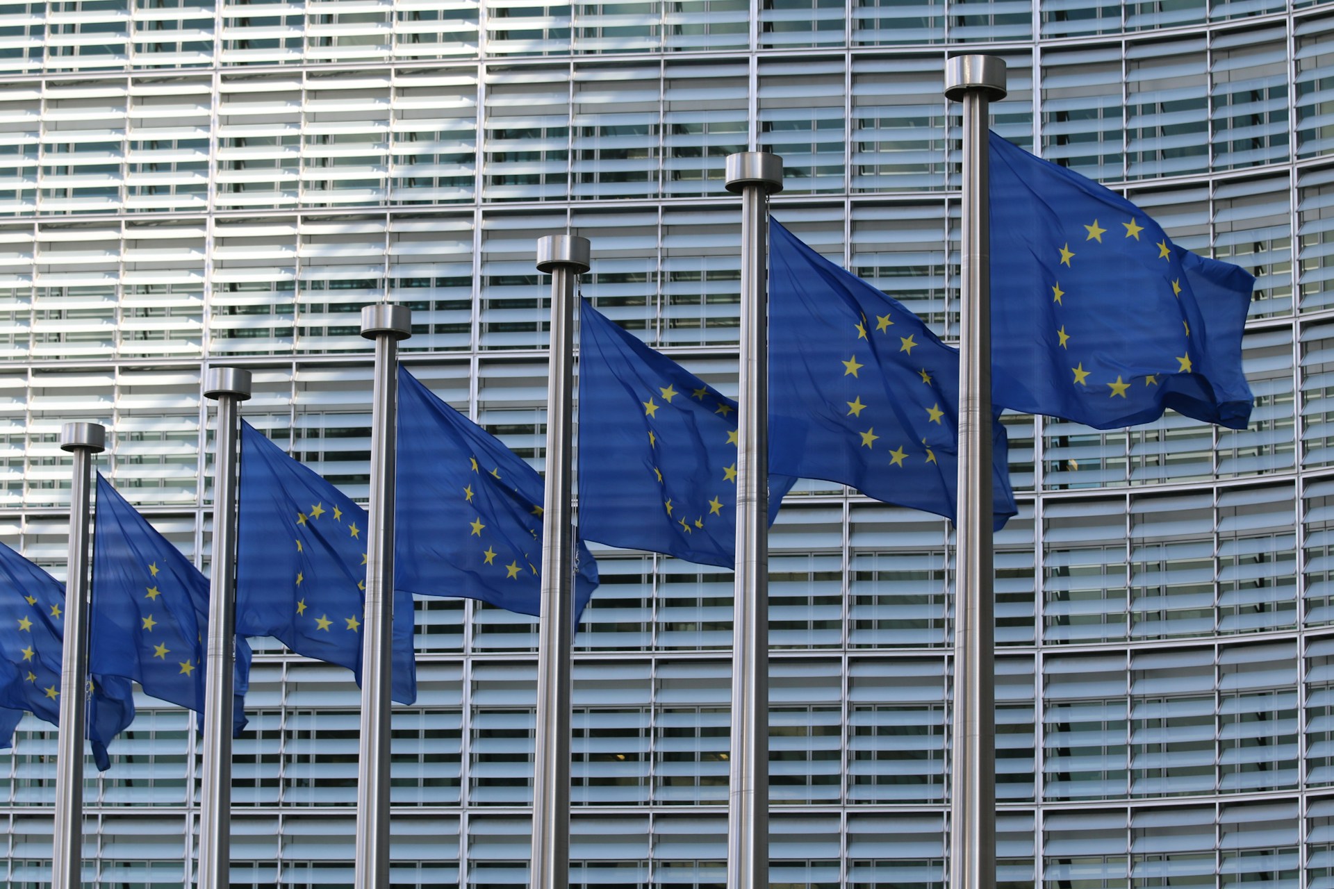 EU infringement action as European Union flags fly outside the European Commission in Brussels