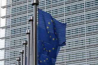 EU-China trade tensions as EU flags fly outside the European Commission in Brussels