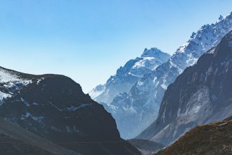 Himalayan glacier collapse in Nepal-Tibet mountain region highlighting flood risks to downstream communities