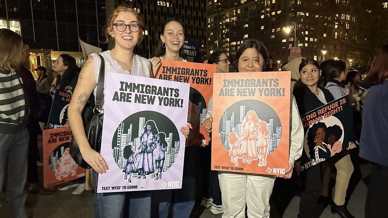Immigrant rights supporters march in Trump immigration protests