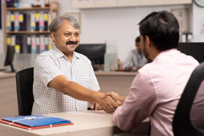 Financial analyst reviewing Indian bank earnings