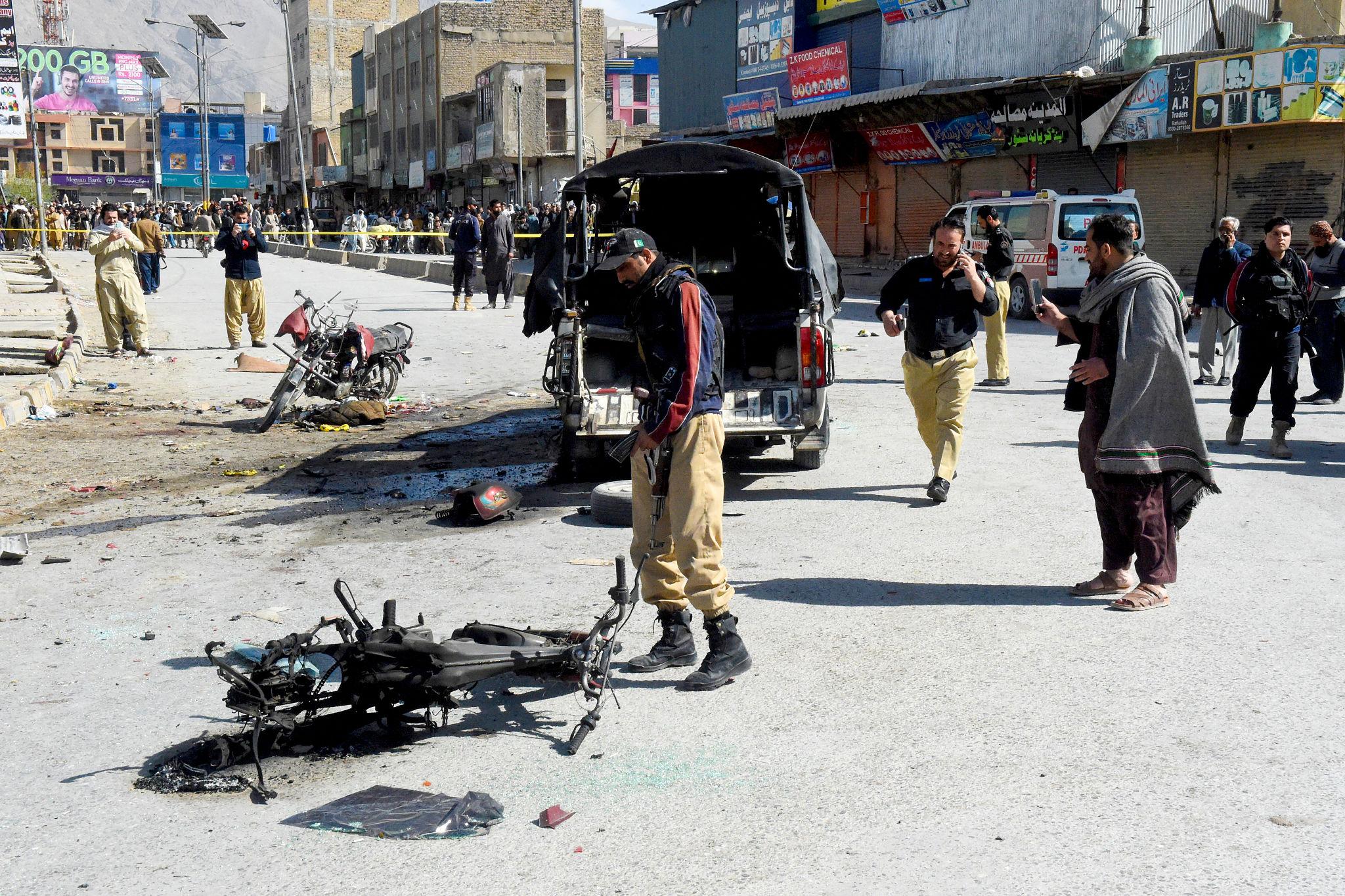 Damaged police vehicle following Pakistan security crisis bombing attack