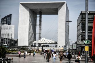 Paris financial district as European markets respond to economic and political uncertainty in France.