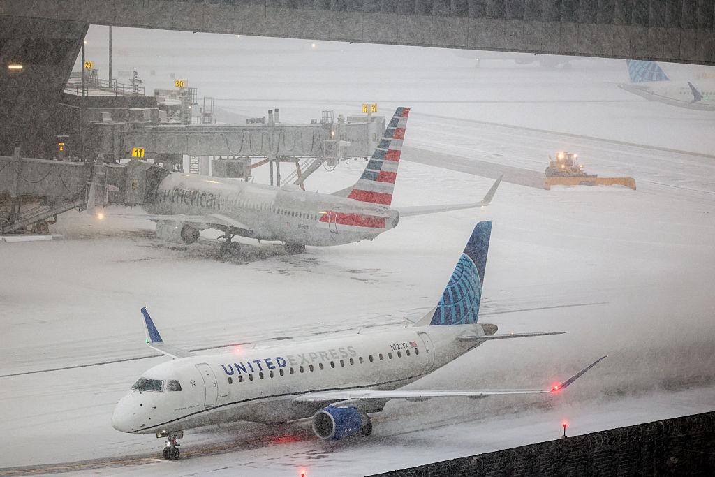 Airport flight delays caused by US Northeast winter storm 2026 in major city hub