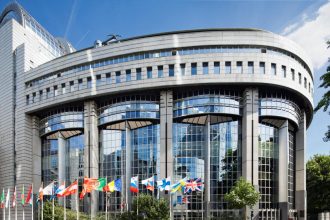 European Parliament building in Brussels where EU long-term budget negotiations are under scrutiny.