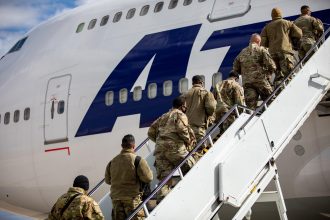 Military deployment update highlighting military families adapting to extended deployments