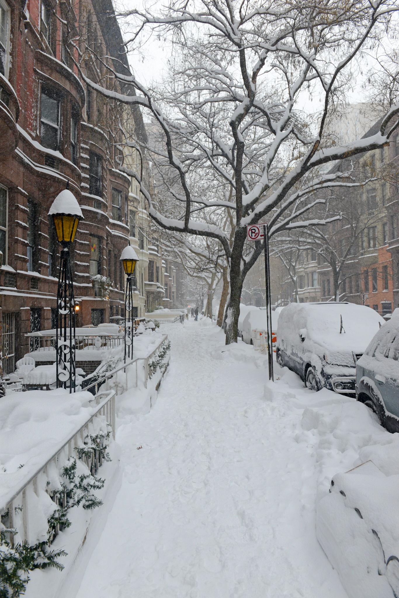 US Northeast winter storm 2026 covering New York City streets in heavy snow