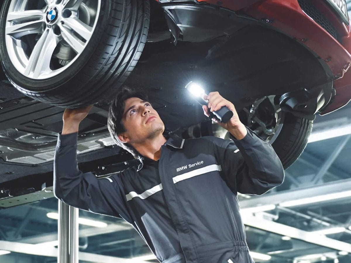 Close up of engine wiring harness linked to BMW vehicle wiring issue recall 2026