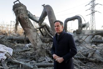 Russian power strikes leave damage at Kyiv's Darnytska thermal power plant, inspected by Ukrainian and NATO officials.