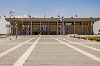 Israeli parliament in Jerusalem amid political uncertainty following election exit polls.