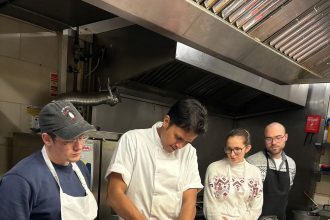 Dev Biswal leading Indian cookery classes in Canterbury